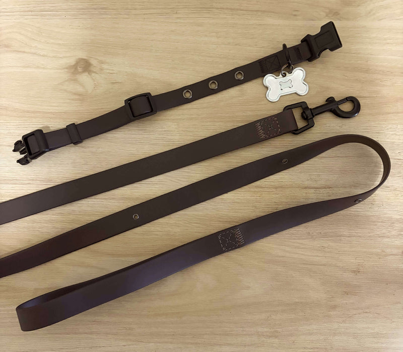 Brown waterproof dog leash and matching collar set with black hardware, handcrafted from vegan leather by Pooches & Cream.